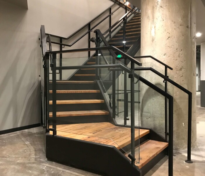 Interior of the baldwin apartments with custom glass railings.